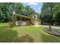 Charming home with a well-manicured lawn and inviting front porch at 269 Powder Mill Dr, Dallas, GA 30157