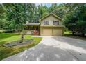 Charming home boasts a two-car garage, well-maintained lawn, and a cozy front porch at 269 Powder Mill Dr, Dallas, GA 30157