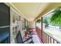 Inviting porch features rocking chairs and hanging ferns for a relaxing outdoor space at 269 Powder Mill Dr, Dallas, GA 30157