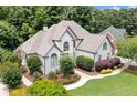 Beautiful two-story home with well-maintained landscaping in a wooded setting at 1345 Benbrooke Nw Ln, Acworth, GA 30101