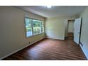 Inviting living room showcasing wood-look floors, neutral paint, and natural light at 3985 Lindsey Dr, Decatur, GA 30035