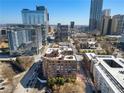 Great view of the city around the apartment building with lovely red brick exterior at 115 W Peachtree Nw Pl # 602, Atlanta, GA 30313