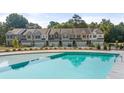 Enjoy the community pool featuring a cool and refreshing recreational amenity for residents to relax and socialize at 1317 Aura Ln, Lawrenceville, GA 30045