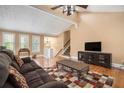 Cozy living room featuring hardwood floors, neutral paint and stairway access to the second floor at 1105 Tom Lane Ln, Marietta, GA 30066