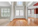 Bright, open foyer featuring hardwood floors and natural light at 2602 Alcovy Club Dr, Dacula, GA 30019
