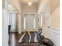 Elegant foyer with hardwood floors, high ceilings, and decorative molding at 2844 Bluestone Sw Dr, Atlanta, GA 30331