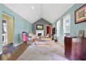 Bright living room featuring hardwood floors, fireplace, and neutral paint at 4636 Chamblee Tucker Rd, Tucker, GA 30084