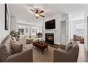 Bright and airy living room with hardwood floors, a fireplace, and open-concept design at 507 Bonneset Ct, Canton, GA 30114
