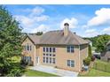 Beautiful home boasting a large, lush backyard perfect for outdoor entertaining at 3843 Dragon Fly Ln, Loganville, GA 30052