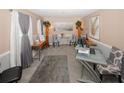 Inviting living room with neutral walls, gray carpet, and elegant decor at 1964 Cutters Mill Way, Lithonia, GA 30058