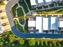 Birds-eye view of townhomes highlighting the meticulously landscaped grounds at 2076 Holtz Ln, Atlanta, GA 30318