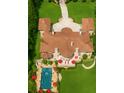 Expansive estate featuring a luxurious pool, sprawling lawn, and a circular driveway at 720 Heards Ferry Rd, Sandy Springs, GA 30328