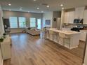 Open-concept layout featuring a modern kitchen and a comfortable living area at 2670 Greenbelt Rd, Snellville, GA 30078