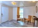 Interior room with painted walls, grey vinyl floors, and furniture set at 2958 Klondike Rd, Lithonia, GA 30038
