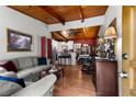 Inviting living room with a wood-beamed ceiling and dining area at 2355 Ewing Ne Dr, Brookhaven, GA 30319
