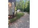 View of backyard and storage building at 255 Emerald Pointe Dr, Carrollton, GA 30116