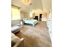 Spacious main bedroom with wood-look flooring and a peaceful, light-filled ambiance at 27 Riverview Trl, Euharlee, GA 30145
