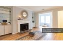 Inviting living room with fireplace, decorative mirror, and built-in shelving at 1941 Brian Way # 1941, Decatur, GA 30033