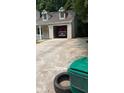 Attached garage provides convenient parking and storage, offering easy access to the home's entrance at 1009 Autumn Crest Ct, Stone Mountain, GA 30083