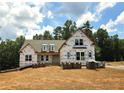 New home construction showcasing the exterior and construction phase at 7791 Capps Ridge Ln, Douglasville, GA 30135