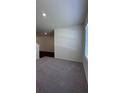 Spacious living room with carpeted flooring and natural light from the window at 34 Sonoma Drive, Dallas, GA 30157