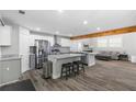 Modern kitchen with stainless steel appliances, granite countertops and center island with seating at 671 Lost Creek Cir, Stone Mountain, GA 30088