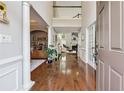 Grand foyer with hardwood floors, soaring ceilings, and an open view of the home's interior at 775 Gran Heritage Way, Dacula, GA 30019
