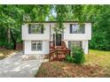 Charming two-story home with a well-maintained yard and a welcoming entryway at 2290 Wilkins Cv, Decatur, GA 30035