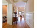 Elegant hallway with hardwood floors, detailed molding and trim throughout at 1255 Mcminn Way, Snellville, GA 30078