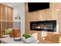 Living room showcases a modern fireplace, decorative accessories, and stylish decor at 1505 Ezra Church Nw Dr, Atlanta, GA 30314