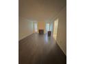 Bright living room with hardwood floors, fireplace and natural light at 2340 Beaver Ruin Rd # Un37, Norcross, GA 30071