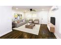 Comfortable living room with stylish decor, a neutral color palette, and ample natural light at 2027 Lois Pl, Atlanta, GA 30318