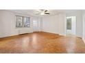 Spacious living room featuring hardwood floors, neutral paint and natural light at 300 Peachtree Ne St # 5A, Atlanta, GA 30308