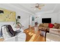 Bright living room featuring hardwood floors, neutral paint, and comfortable seating at 1026 Saint Charles Ne Ave # 8, Atlanta, GA 30306