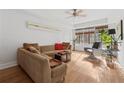 Inviting living room with hardwood floors, a cozy sectional sofa, and ample natural light at 1026 Saint Charles Ne Ave # 8, Atlanta, GA 30306