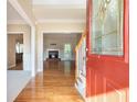 Inviting entryway with hardwood floors, opening into a spacious living area with a fireplace at 1290 Mount Mckinley Dr, Grayson, GA 30017