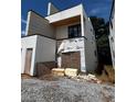 Side view of modern home's exterior showing construction and sleek architectural details at 308 Fortune Ne St # A, Atlanta, GA 30312