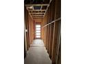 Framed hallway featuring natural light streaming through a modern door, showcasing the interior's layout at 308 Fortune Ne St # A, Atlanta, GA 30312