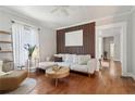 Bright living room featuring hardwood floors, stylish decor, and abundant natural light at 761 Bellemeade Nw Ave, Atlanta, GA 30318