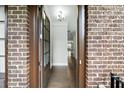 View through the open front door showing hardwood floors and bright, neutral paint at 1618 Durden Ne Rd, Atlanta, GA 30319