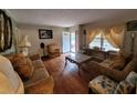 Inviting living room featuring hardwood floors, ample natural light, and classic decor at 1712 Clifton Se Way, Atlanta, GA 30316