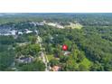A home surrounded by lush trees and is near shopping, schools, and downtown at 357 W Hightower Trl, Social Circle, GA 30025