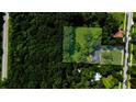 Expansive lot with mature trees surrounding the home, offering privacy and a serene environment at 357 W Hightower Trl, Social Circle, GA 30025