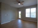 Spacious living room with wood floors and natural light at 870 Mayson Turner Nw Rd # 1344, Atlanta, GA 30314