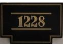 Close-up of unit number 1228 sign with gold numbers at 870 Mayson Turner Nw Rd # 1228, Atlanta, GA 30314