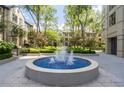 Picturesque courtyard with a charming water fountain at The Oaks Buckhead at 3475 Oak Valley Ne Rd # 910, Atlanta, GA 30326