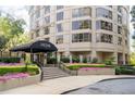 Welcoming entrance to The Oaks Buckhead with lush greenery and a classic awning at 3475 Oak Valley Ne Rd # 910, Atlanta, GA 30326