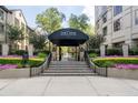 Elegant entrance to The Oaks Buckhead featuring manicured landscaping and a welcoming gate at 3475 Oak Valley Ne Rd # 910, Atlanta, GA 30326