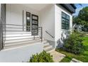 Close up of the entrance with stairs and metal railing at 833 Humphries Sw St, Atlanta, GA 30310