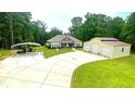 Charming single-story home with detached garage and spacious driveway at 7460 Highway 101, Rockmart, GA 30153
